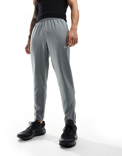 Challenger - Pantalon de jogging en tissu Dri-FIT - Nike Running - Modalova
