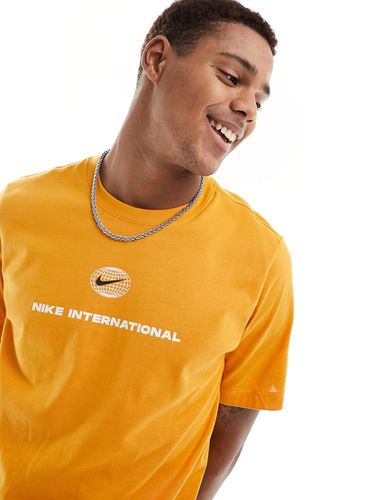 Heritage - T-shirt en tissu Dri-FIT - Orange - Nike Running - Modalova