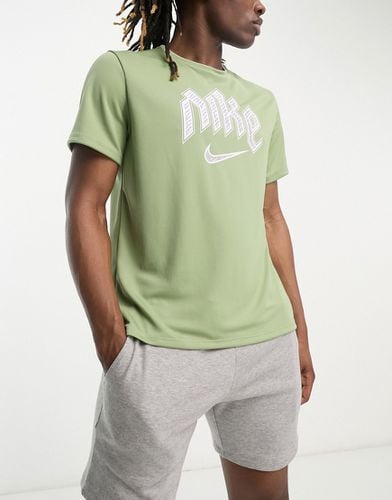 Run Division Miler - T-shirt à logo virgule - Kaki - Nike Running - Modalova