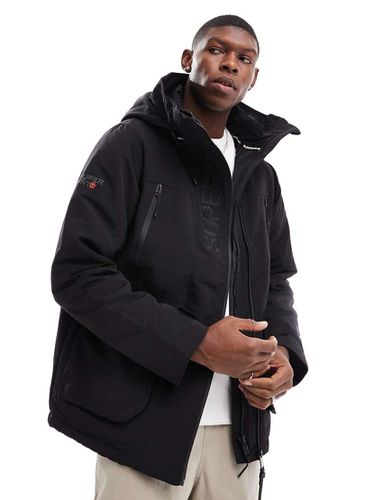 Ultimate - Veste coupe-vent à capuche avec broderies - Superdry - Modalova