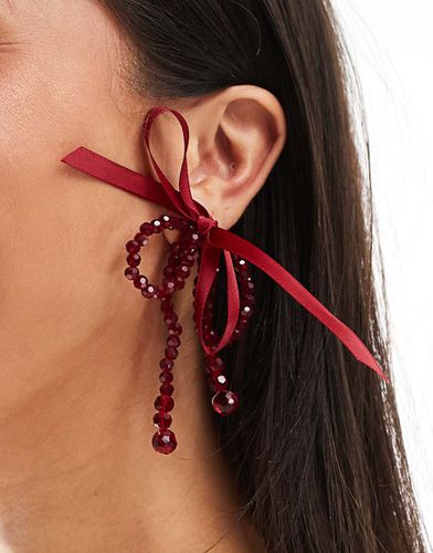 Boucles d'oreilles de Noël avec naud en perles et ruban - Pieces - Modalova