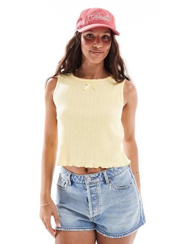 Top sans manches court en maille pointelle avec naud - ple - Pieces - Modalova