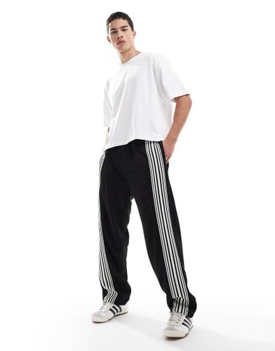 Pantalon de jogging large  rayures - Pull & bear - Modalova