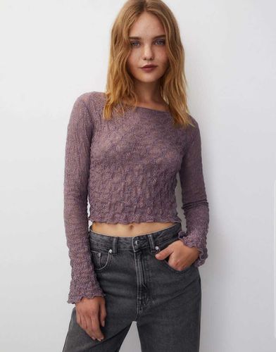 Top en dentelle à manches longues et détail évasé - Pull & bear - Modalova