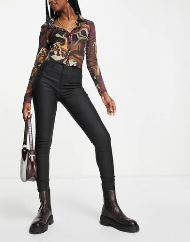 Jean skinny enduit taille haute - River Island - Modalova