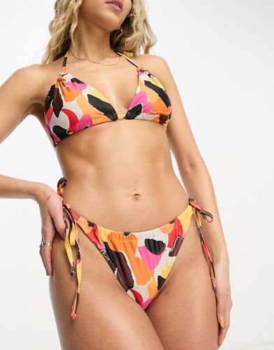 Melissa - Bas de bikini noué sur les côtés à imprimé style papier rétro - We Are We Wear - Modalova
