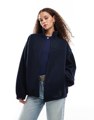 Lea - Sweat-shirt imitation peau de mouton zippé oversize - Weekday - Modalova