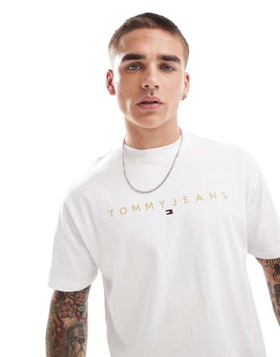 T-shirt à logo linéaire - et doré - Tommy Jeans - Modalova