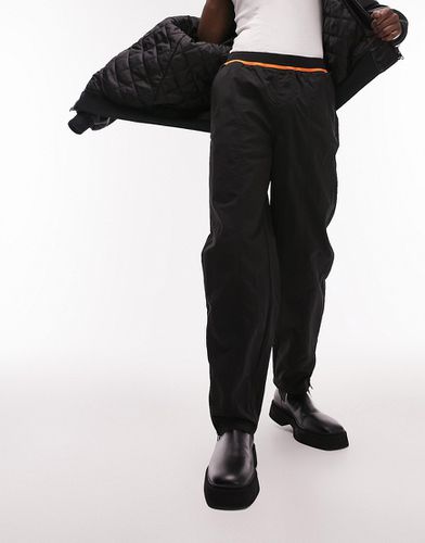 Pantalon ample en nylon à taille élastiquée avec liseré orange - Topman - Modalova