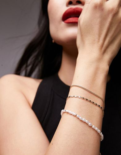 Bracelet 3 rangs avec perles et chaîne - Topshop - Modalova