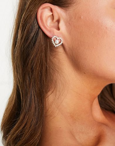 Boucles d'oreilles caurs ornés de strass avec perle - True Decadence - Modalova