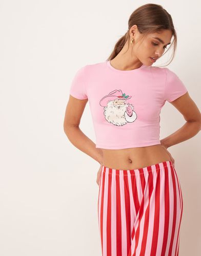 Pyjama de Noël en polyester t-shirt à manches courtes avec imprimé père Noël cow-boy et pantalon à rayures - Rose et rouge - Urban Threads - Modalova