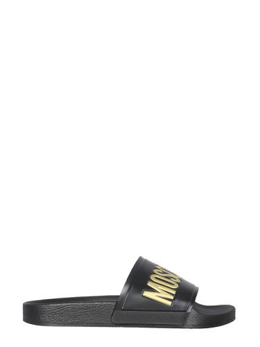 Moschino slide sandals with logo - moschino - Modalova