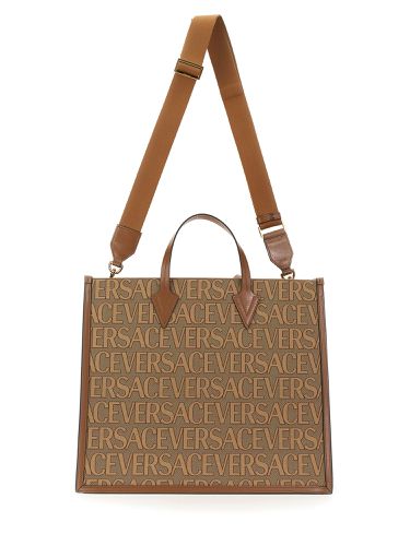 Shopper bag with allover logo - versace - Modalova