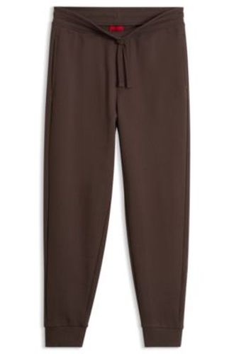 Pantalon casual en coton avec poignets élastiques - HUGO - Modalova