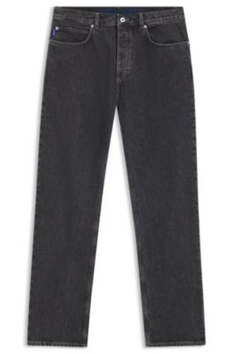 Jean Baggy en denim noir avec logo délavé - HUGO - Modalova