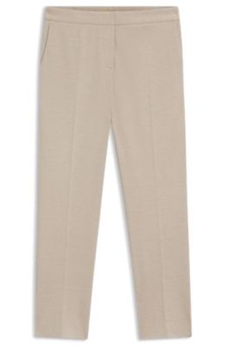 Pantalon Slim en jersey stretch performant à motif - Boss - Modalova