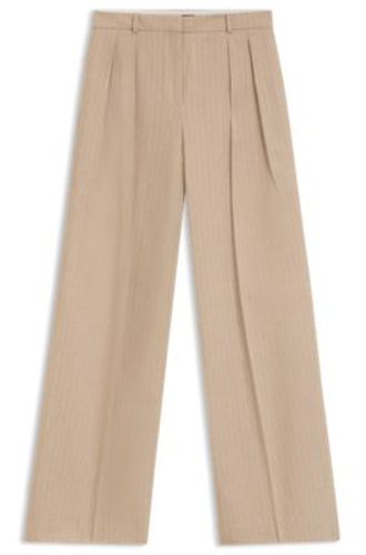 Pantalon Regular Fit en coton mélangé à rayures tennis brillantes - HUGO - Modalova