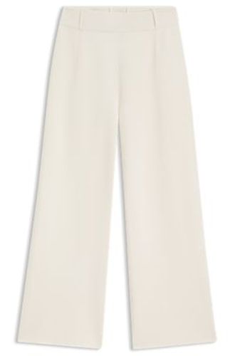 Pantalon Regular en maille à pinces - Boss - Modalova