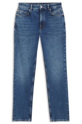 Jean Regular en denim mi-foncé doux au toucher peau de pêche - Boss - Modalova