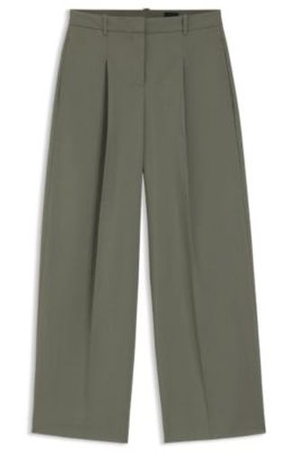 Pantalon jambe large en laine vierge italienne - Boss - Modalova