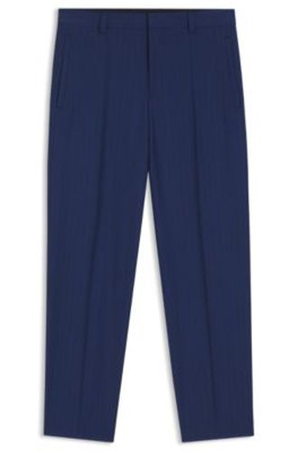 Pantalon Slim en laine vierge à rayures craie - HUGO - Modalova