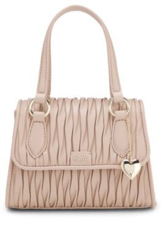 Sac à main en similicuir matelassé avec breloque cœur en métal - HUGO - Modalova