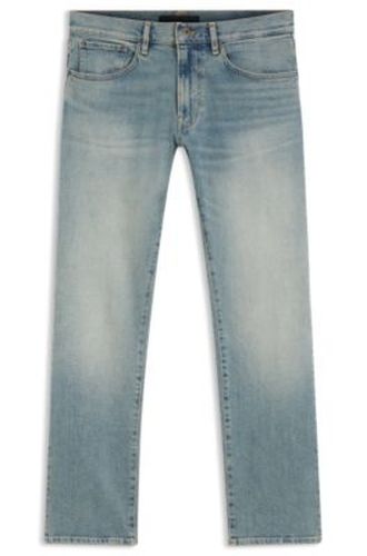 Jean Slim en denim stretch bleu BY BECKHAM - Boss - Modalova