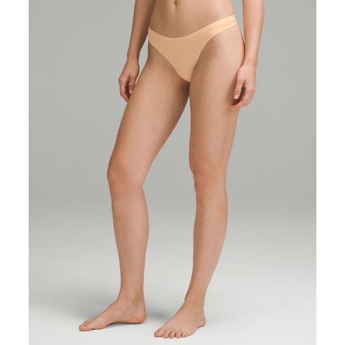 – String Wundermost taille basse en Ultra-Soft Nulus – Orange/Pastel – Taille L - lululemon - Modalova