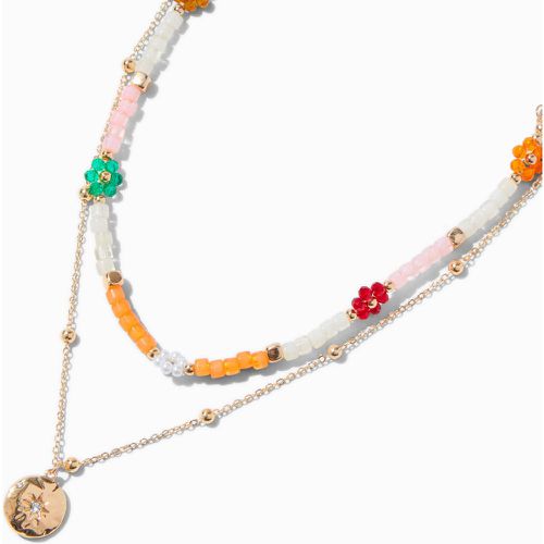 Collier multi-rangs pendentif boussole couleur et fleur perlée - Claire's - Modalova