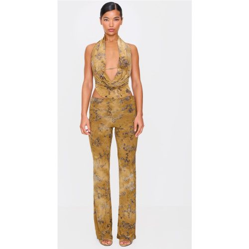 Pantalon slim flare dévoré imprimé fleuri | Taille 38 - PrettyLittleThing - Modalova