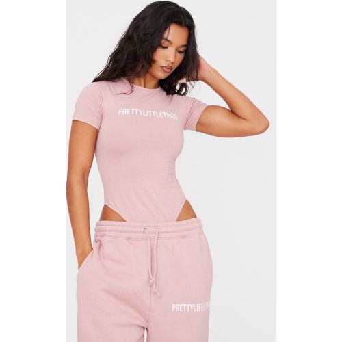 Body à logo et manches courtes | Taille Large - PrettyLittleThing - Modalova