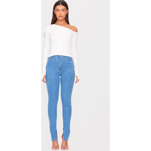 Jean skinny délavé bleu clair à ourlet fendu - PrettyLittleThing - Modalova