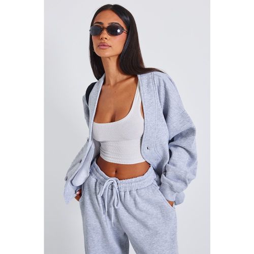 Petite Sweat à boutons et poches sur les côtés - PrettyLittleThing - Modalova