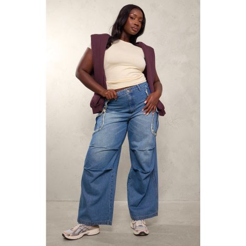 Plus Jean large indigo délavé style cargo à poches élimées - PrettyLittleThing - Modalova
