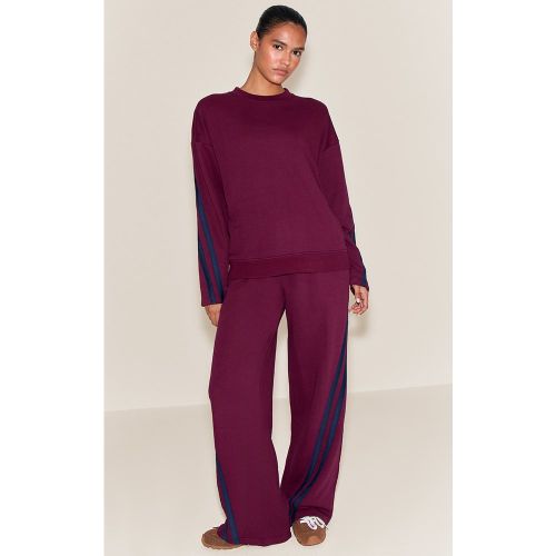 Jogging large à rayures contrastées | Taille Large - PrettyLittleThing - Modalova