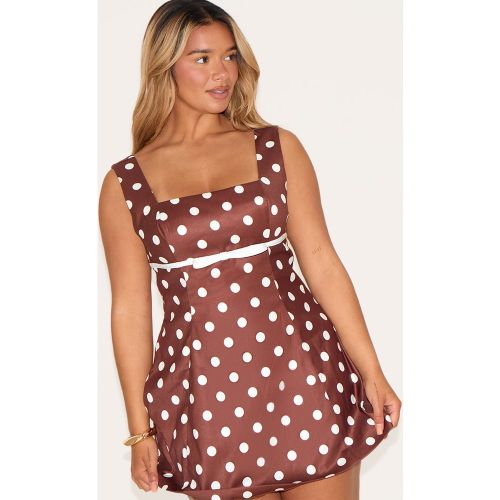 Shape Mini robe trapèze imprimé pois à col droit et noeud - PrettyLittleThing - Modalova