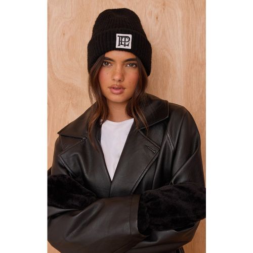 Bonnet replié en maille tricot brossée à logo PLT - PrettyLittleThing - Modalova