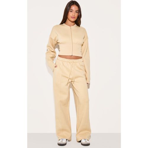 Jogging large gris pierre naturel à coutures surjetées - PrettyLittleThing - Modalova