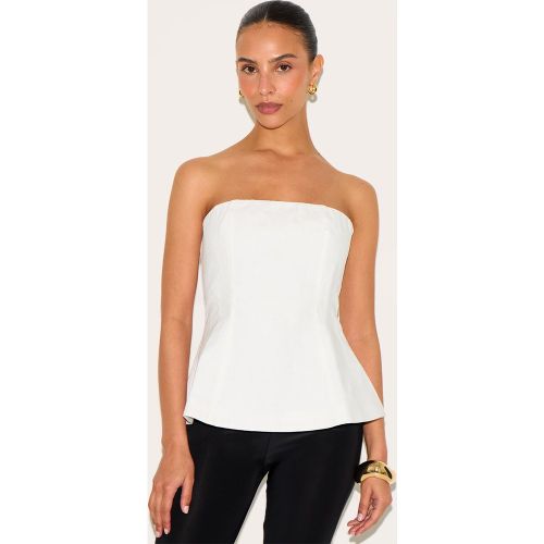 Petite Top bustier long structuré à ourlet péplum - PrettyLittleThing - Modalova