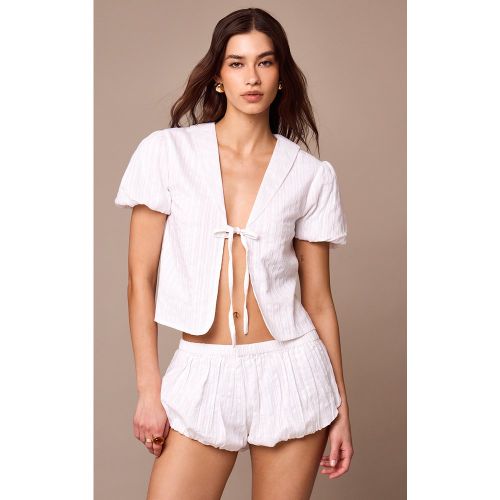 Blouse en coton brodé nouée devant - PrettyLittleThing - Modalova