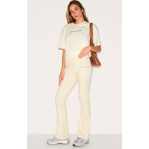 Pantalon flare à imprimé | Taille 36 - PrettyLittleThing - Modalova