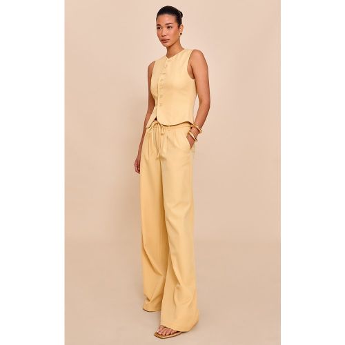 Pantalon de tailleur large tissé à détail noué - PrettyLittleThing - Modalova