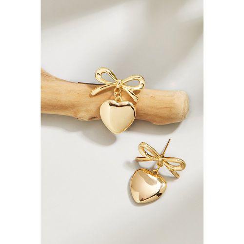Boucles d'oreilles pendantes avec cœur en métal doré avec nœud - CUPSHE - Modalova