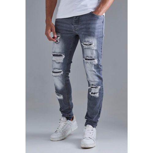 Jean skinny à genoux déchirés - 28R - Boohooman - Modalova