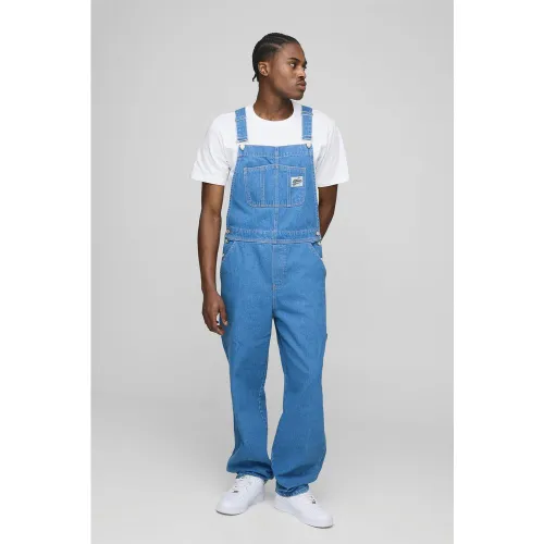 Salopette large en jean - 28R - Boohooman - Modalova
