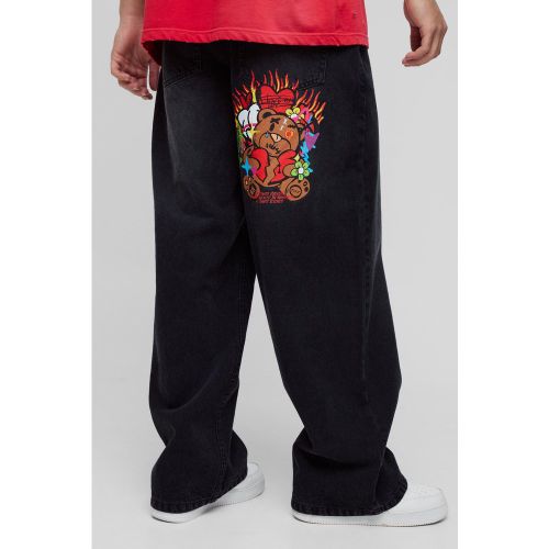 Jean baggy en denim à écussons - 28R - Boohooman - Modalova