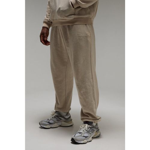 Jogging oversize délavé à slogan - MAN Active - 2XL - Boohooman - Modalova