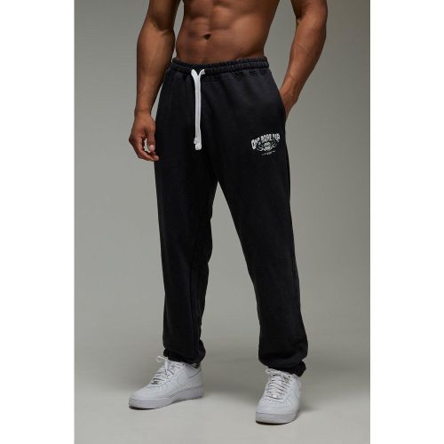 Jogging oversize délavé à slogan - MAN Active - 2XL - Boohooman - Modalova