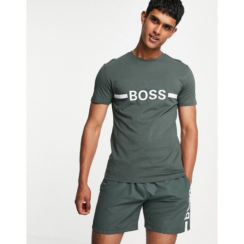 BOSS - Beachwear - T-shirt ajustée à protection solaire avec grand logo sur le devant - Kaki - BOSS Bodywear - Modalova